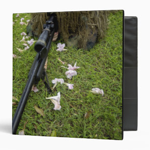 Soldier practices sniper tactics 3 ring binder
