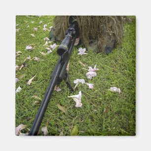 Soldier practices sniper tactics magnet