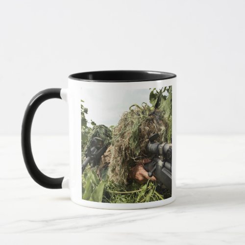 Soldiers dressed in ghillie suits mug