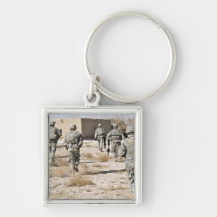 soldiers respond to a small arms attack keychain