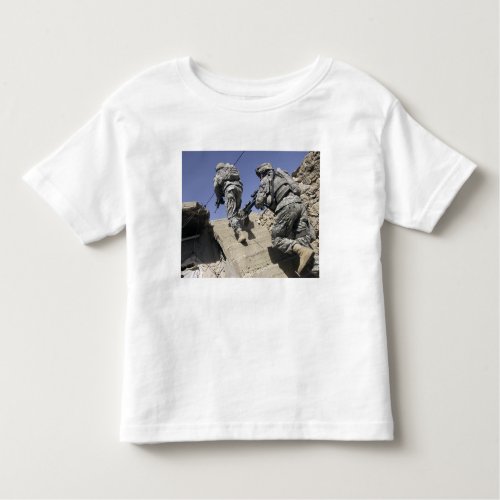 Soldiers running up staircase of a building toddler t_shirt