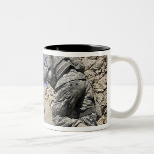 Soldiers running up staircase of a building Two_Tone coffee mug