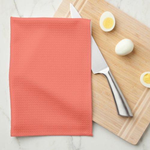 Solid bright coral kitchen towel