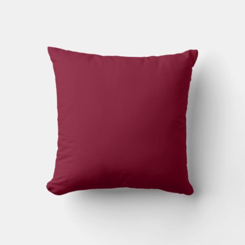Solid color burgundy maroon throw pillow