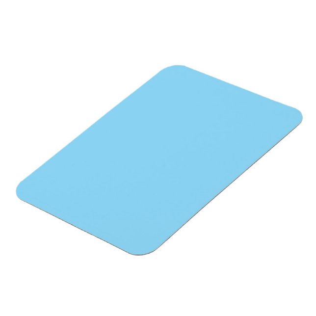 Solid light blue background evenly colored magnet (Left Side)