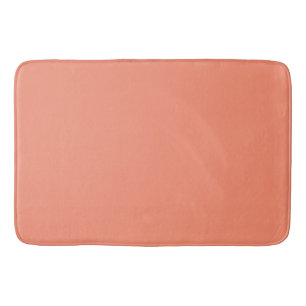 Solid peach bath mat