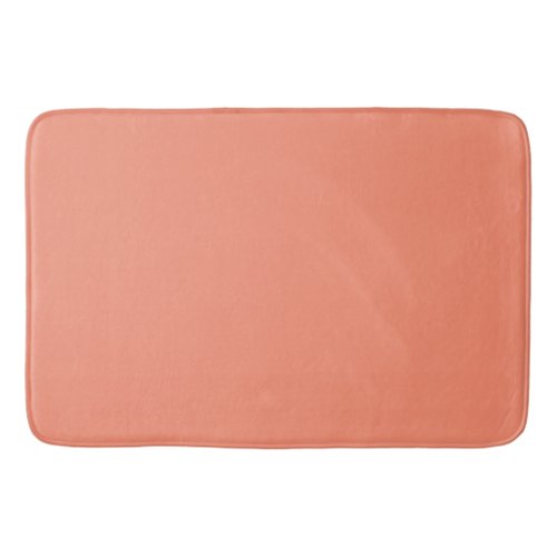 Solid peach bath mat