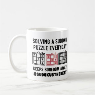 Solving a sudoku puzzle everyday coffee mug