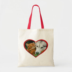 Somali cat and Siberian Husky cute friends huddle Tote Bag