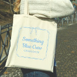 Something Blue Crew Elegant Bow Custom Name  Tote Bag<br><div class="desc">Join the latest bridal trend with our Customizable 'Something Blue Crew' Tote Bag! Perfect for your bridal party, this elegant tote features a stylish blue design with customizable text to add a personal touch. It's ideal for carrying all your wedding day essentials or as a keepsake for your bridesmaids or...</div>