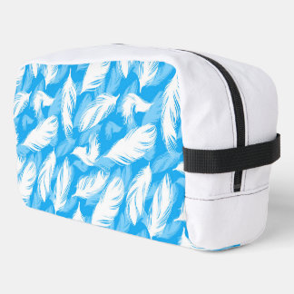 Sophisticated Feather Design On A Bright Blue  Dopp Kit