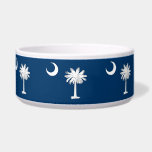 South Carolina State Flag Pet Bowl<br><div class="desc">Elevate your pet's dining experience with this stylish pet bowl featuring the flag of South Carolina! Crafted with meticulous attention to detail, this pet bowl celebrates South Carolina's heritage and state pride. The design proudly showcases the iconic flag of South Carolina, featuring a white crescent and a palmetto tree on...</div>