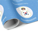 South Korean Angel Hanukkah Flag Personalized  Wrapping Paper<br><div class="desc">Design, on personalized gift wrapping paper, has an angel wearing the Flag of the Republic of Korea, or South Korea. Above, the words, in white letters, read, HANUKKAH 20??. Below, a place for a name, yours, for a personalized look, or, your gift recipient's for a thoughtful gift wrap. The angel...</div>