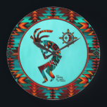 Southwest Kokopelli Large Clock<br><div class="desc">Brighten Up Your Room with this Unique "One of a Kind" Southwest Kokopelli Wall Clock! It Features a Southwest Kokopelli Playing the Flute and Dancing Under the Sun on a Turquoise Background... Surrounded by a Southwest Border in Turquoise, Orange & Black!
Original Art Design By Artist Kerry Miller.</div>