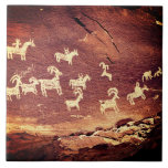 Southwest Petroglyph Ceramic Tile<br><div class="desc">Southwest Petroglyph Ceramic Tile is a rock painting that displays art from Native American cultures. Petroglyphs (also called rock engravings) are pictogram and logogram images created by removing part of a rock surface by incising, picking, carving, and abrading. Outside North America, scholars often use terms such as "carving", "engraving", or...</div>