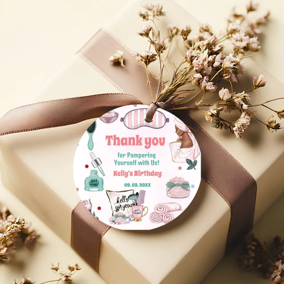 a beige gift with brown ribbon and pink sprigs surround the round favor tag. On the tag there are hand-drawn illustrations of an eye mask, toiletries, a woman in a towel and beauty products in shades of pink and turquoise.