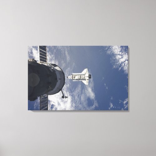 Space Shuttle Atlantis and a Russian spacecraft Canvas Print