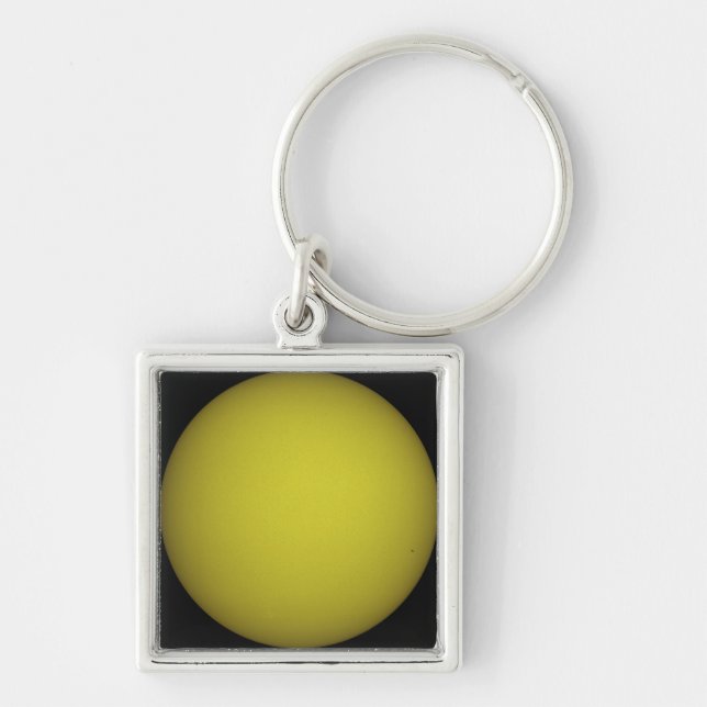 Space Shuttle Atlantis is seen in silhouette Keychain (Front)