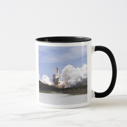 Space Shuttle Atlantis lifts off 27 Mug