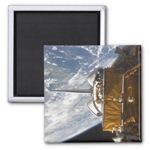 Space Shuttle Atlantis payload bay backdropped Magnet