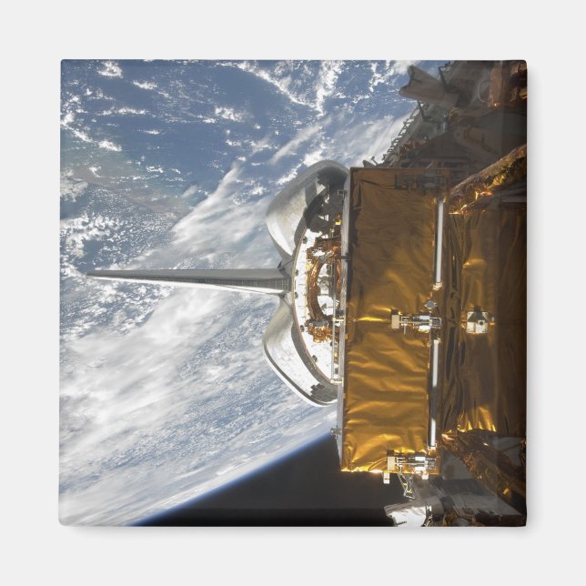 Space Shuttle Atlantis' payload bay backdropped Magnet (Front)