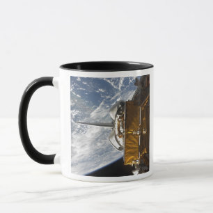 Space Shuttle Atlantis' payload bay backdropped Mug