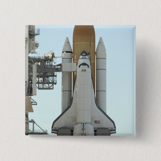 Space shuttle Atlantis sits on the launch pad Button (Front)