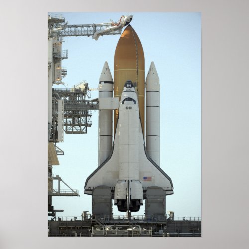 Space shuttle Atlantis sits on the launch pad Poster