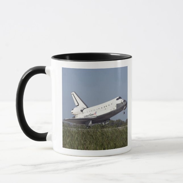 Space shuttle Atlantis touches down on Runway 3 Mug (Left)