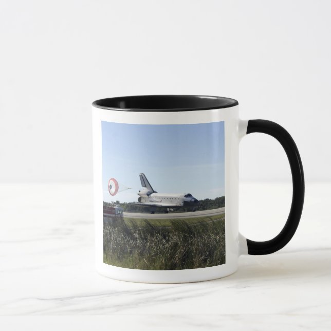 Space shuttle Atlantis unfurls its drag chute Mug (Right)