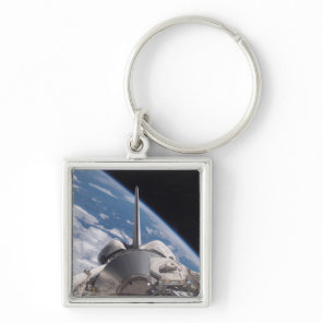 Space Shuttle Discovery backdropped by Earth Keychain
