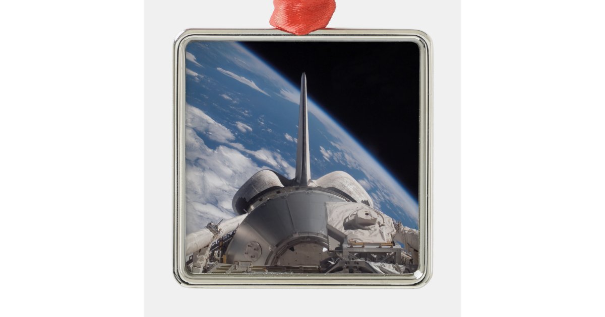 Space Shuttle Discovery backdropped by Earth Metal Ornament | Zazzle