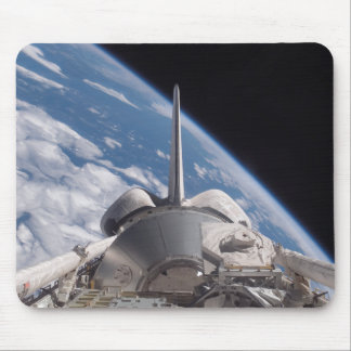 Space Shuttle Discovery backdropped by Earth Mouse Pad