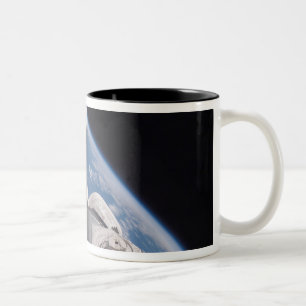 Space Shuttle Discovery backdropped by Earth Two-Tone Coffee Mug