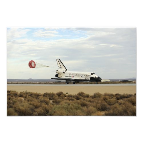 Space Shuttle Discovery deploys its drag chute Photo Print
