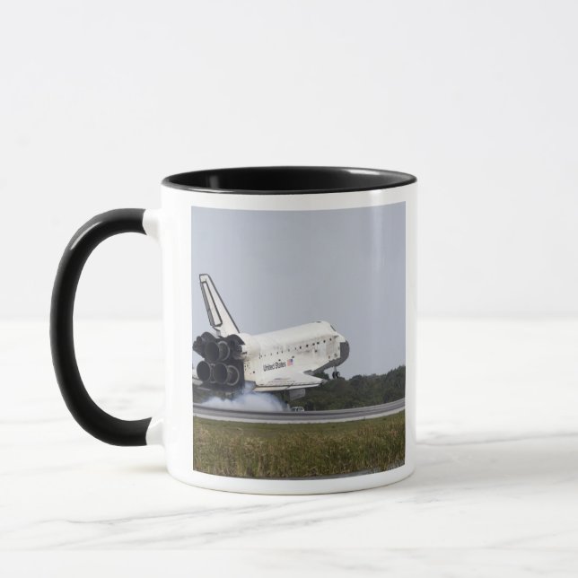 Space Shuttle Discovery touches down 2 Mug (Left)