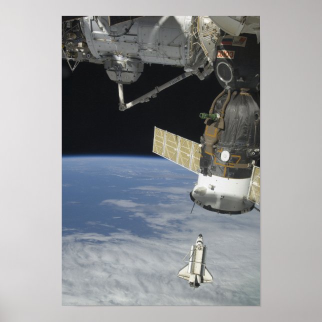 Space shuttle Endeavor, a Soyuz spacecraft Poster (Front)