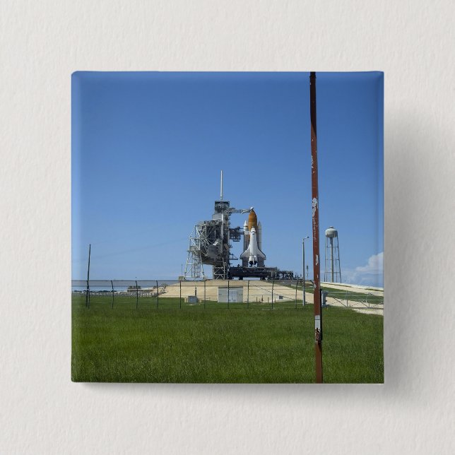 Space shuttle Endeavour is framed by a windsock Button (Front)