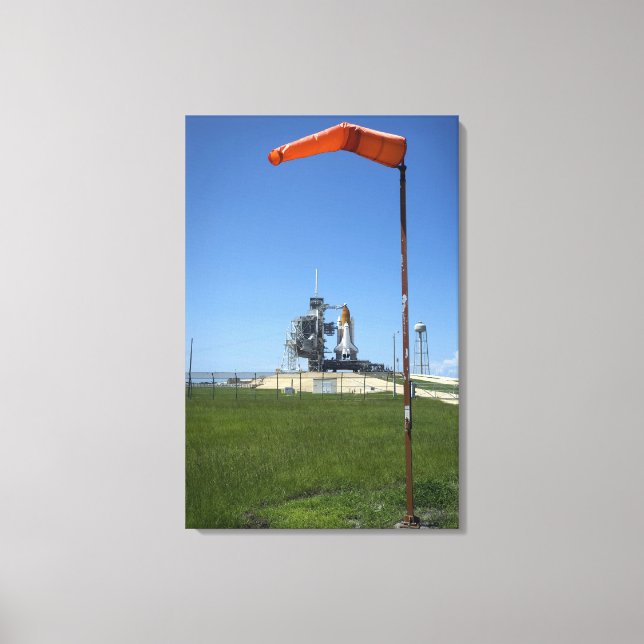 Space shuttle Endeavour is framed by a windsock Canvas Print (Front)