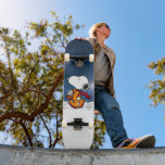 SPACE | Snoopy Skateboard<br><div class="desc">This Peanuts artwork celebrates the 50th Anniversary of the 1969 Apollo 10 orbit of the moon and the Apollo 11 moon landing. This design features Snoopy in his orange space suit.</div>