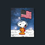 SPACE | Snoopy With Flag Astronaut Canvas Print<br><div class="desc">This Peanuts artwork celebrates the 50th Anniversary of the 1969 Apollo 10 orbit of the moon and the Apollo 11 moon landing. This design features Snoopy in his orange space suit flying the American flag.</div>