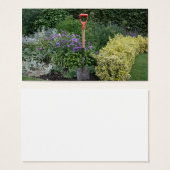 Spade in flower bed (Front & Back)