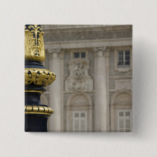 Spain, Madrid. Royal Palace, ornate gilded lamp Button