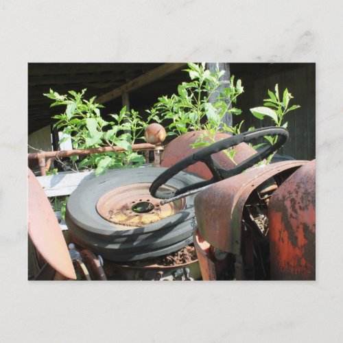 Spare Tire In The Seat Of A Scrap Tractor Postcard