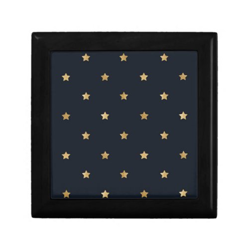 Sparkling golden stars on midnight black gift box