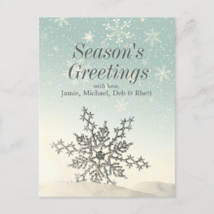 Sparkling snowflake in the snow postcard