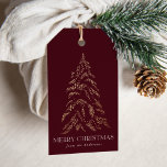 Sparkling Winter Pine Merry Christmas Gift Tags<br><div class="desc">Modern and elegant holiday gift tags featuring a snowy faux gold foil pine tree with a burgundy background (or color of your choice). "Merry Christmas" is displayed in a white,  modern serif font with your name or custom text below.</div>