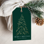 Sparkling Winter Pine Merry Christmas Gift Tags<br><div class="desc">Modern and elegant holiday gift tags featuring a snowy faux gold foil pine tree with a dark green background (or color of your choice). "Merry Christmas" is displayed in a white,  modern serif font with your name or custom text below.</div>
