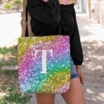 Sparkly Girly Rainbow Chunky Glitter Monogram Tote Bag<br><div class="desc">A modern bold single letter double layer text monogram in white with a black drop shadow. The font size, color and style are customizable. The background is a faux chunky glitter in a rainbow of colors (yellow, gold, pink, purple, blue, teal, green) with sparkly and bokeh blur spots. Move or...</div>