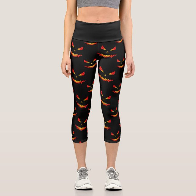 Sparkly Jack O'Lantern face Halloween pattern Capri Leggings (Front)